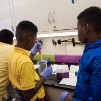 7th and 8th graders from James McHenry Elementary & Middle School aboard the MdBioLab at the UM BioPark